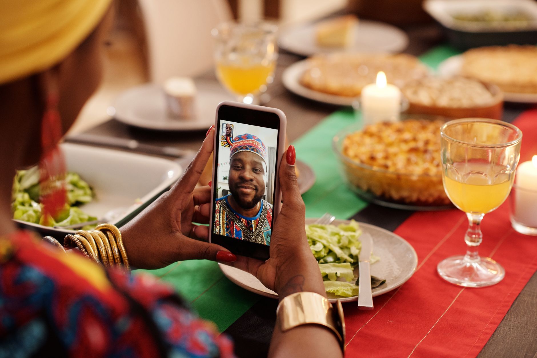 two people having a video call on an iPhone with smiles