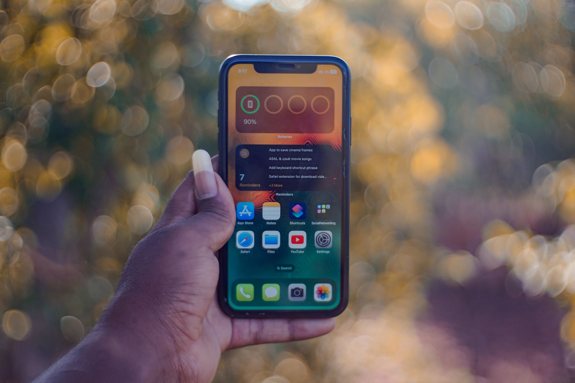 hands holding a smartphone with the settings screen open